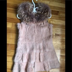 Real rabbit and raccoon fur vest.